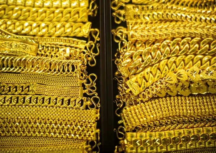 Gold bracelets are displayed inside a gold shop in Bangkok's Chinatown, Thailand, October 9, 2025. REUTERS/Athit Perawongmetha