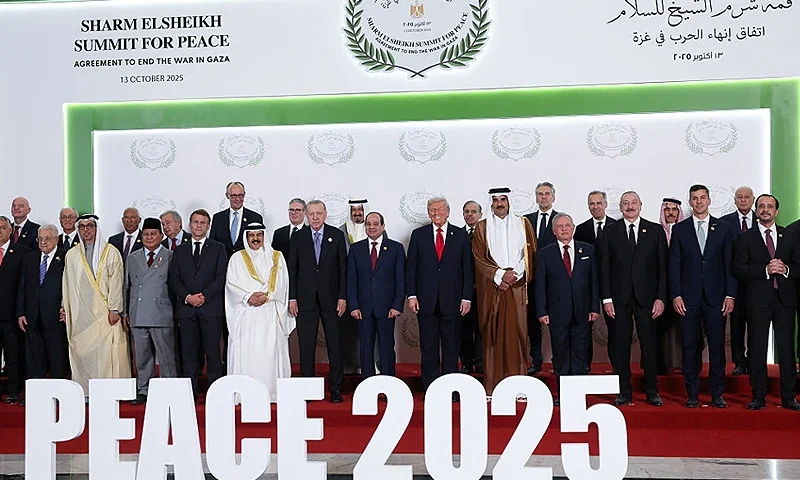SHARM EL-SHEIKH, EGYPT - OCTOBER 13: World leaders including U.S. President Donald Trump, Egypt's President Abdel Fattah al-Sisi, British Prime Minister Keir Starmer, Canadian Prime Minister Mark Carney, French President Emmanuel Macron, German Chancellor Friedrich Merz, Hungarian Prime Minister Viktor Orban, Indonesian President Prabowo Subianto, Jordan's King Abdullah, and Turkish President Tayyip Erdogan, pose for a family photo, at a world leaders' summit on ending the Gaza war on October 13, 2025 in Sharm El-Sheikh, Egypt. President Trump is in Egypt to meet with European and Middle Eastern leaders in what’s being billed as an international peace summit, following the start of a US-brokered ceasefire deal to end the war in the Gaza Strip. (Photo by Suzanne Plunkett - Pool / Getty Images)