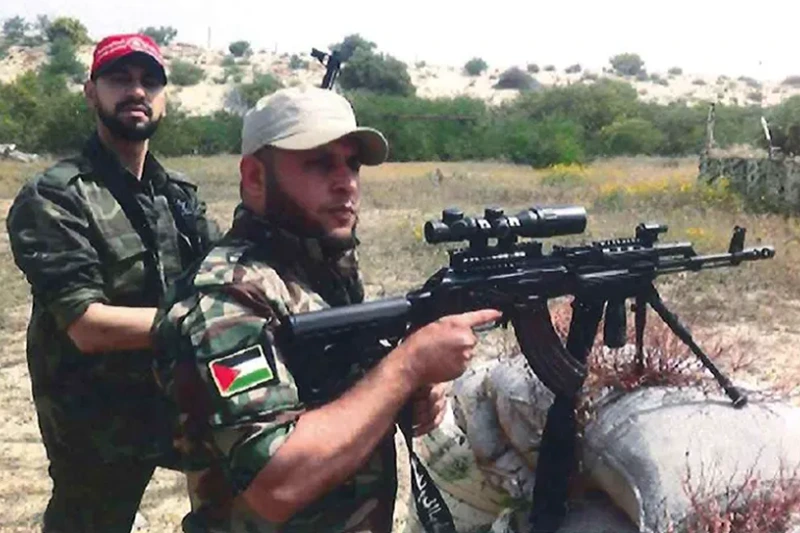 Mahmoud Amin Ya'qub Al-Muhtadi is shown on the left - Department of Justice