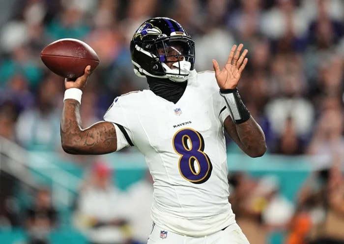 Baltimore Ravens quarterback Lamar Jackson (8) throws against the Miami Dolphins during the first half of an NFL football game, Thursday, Oct. 30, 2025, in Miami Gardens, Fla. (AP Photo/Rebecca Blackwell)