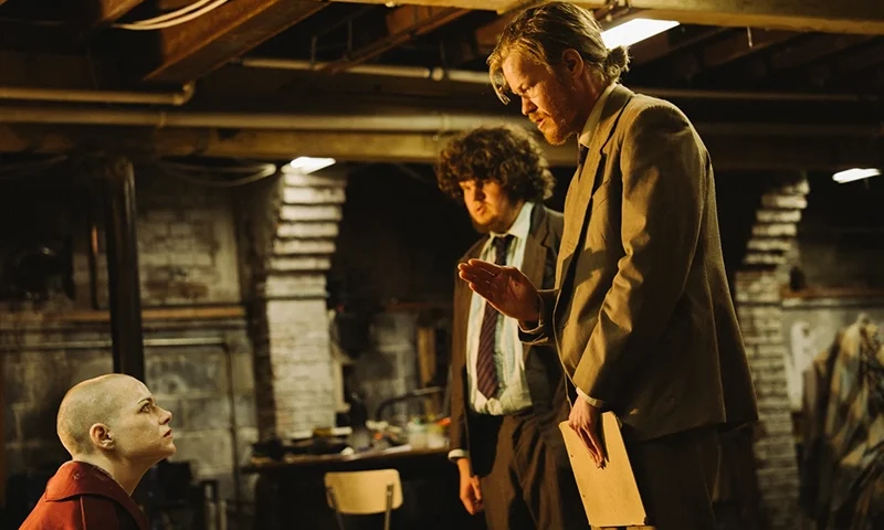 This image released by Focus Features shows Emma Stone, from left, Aidan Delbis, and Jesse Plemons in a scene from “Bugonia.” (Atsushi Nishijima/Focus Features via AP)