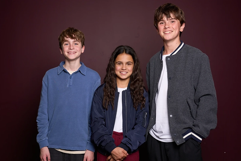 Max Lester, from left, Arabella Stanton and Frankie Treadaway pose for a portrait to promote the Audible “Harry Potter” series in London on July 20, 2025. (Photo by Scott A Garfitt/Invision/AP)