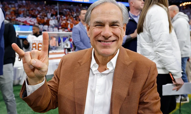 ATLANTA, GEORGIA - JANUARY 01: Texas Governor Greg Abbott poses on the field prior to the Chick-fil-A Peach Bowl between the Texas Longhorns and Arizona State Sun Devils at Mercedes-Benz Stadium on January 01, 2025 in Atlanta, Georgia. (Photo by Todd Kirkland/Getty Images)