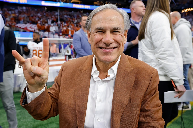 ATLANTA, GEORGIA - JANUARY 01: Texas Governor Greg Abbott poses on the field prior to the Chick-fil-A Peach Bowl between the Texas Longhorns and Arizona State Sun Devils at Mercedes-Benz Stadium on January 01, 2025 in Atlanta, Georgia. (Photo by Todd Kirkland/Getty Images)