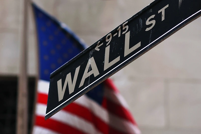 NEW YORK, NEW YORK - APRIL 11: The Wall Street street sign is seen outside of the New York Stock Exchange during morning trading on April 11, 2025 in New York City. Stocks continued to slide amid tariff fears after U.S. President Donald Trump temporarily reduced country-specific duties to a universal rate of 10% except for China. China retaliated by raising its levies on U.S. products to 125% from 84%. (Photo by Michael M. Santiago/Getty Images)