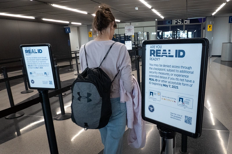 CHICAGO, ILLINOIS - MAY 07: A passenger enters a security checkpoint where travelers who are not compliant with Real ID changes for air travel are directed at O'Hare International Airport on May 07, 2025 in Chicago, Illinois. As of today, air travelers must have a Real ID or equivalent form of identification to verify their identity before passing through airport security to avoid delays or the risk of being unable to fly. (Photo by Scott Olson/Getty Images)