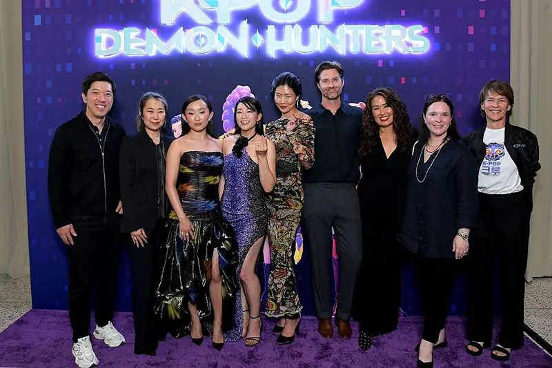 (L-R) Dan Lin, Chairman of Film, Netflix, Maggie Kang, Ji-young Yoo, Arden Cho, May Hong, Chris Appelhans, Michelle Wong, Hannah Minghella, Head of Feature Animation, Netflix and Kristine Belson, President, Sony Pictures Animation, attend the KPop Demon Hunters Special Screening at Netflix Tudum Theater on June 16, 2025 in Los Angeles, California. (Photo by Charley Gallay/Getty Images for Netflix)