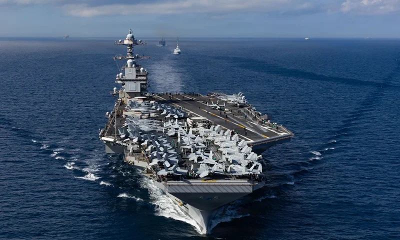 AT SEA- OCTOBER 1: In this handout provided by the U.S. Navy, The From front to back, the USS Gerald R. Ford (CVN 78), Royal Moroccan Navy FREMM multipurpose frigate Mohammed VI (701), and Military Sealift Command fast combat support ship USNS Supply (T-AOE 6), steam in formation while transiting the Strait of Gibraltar, on October 1, 2025. Carrier Strike Group 12 is on a scheduled deployment in the U.S. 6th Fleet area of operation to support the warfighting effectiveness, lethality and readiness of U.S. Naval Forces, Europe-Africa, and defend U.S., Allied and partner interest in the region. (Photo by Alyssa Joy/U.S. Navy via Getty Images)