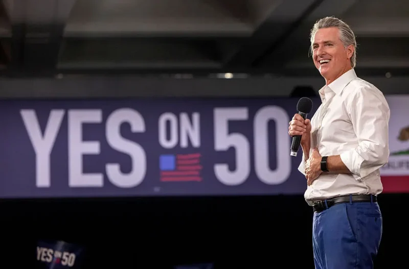LOS ANGELES, CALIFORNIA - NOVEMBER 1: California Governor Gavin Newsom speaks at a "Yes On Prop 50" volunteer event at the LA Convention Center on November 1, 2025 in Los Angeles, California. California's Prop 50 is on the ballot to either authorize or deny temporary changes to congressional district maps. Election Day is November 4th. (Photo by Jill Connelly/Getty Images)