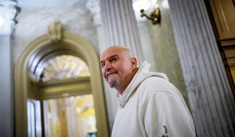 WASHINGTON, DC - NOVEMBER 10: U.S. Sen. John Fetterman (D-PA), one of eight Democrats to say he will vote with Republicans to open the government, arrives for votes on November 10, 2025 on Capitol Hill in Washington, DC. The Senate reached a deal late Sunday to fund the government, aiming to end the longest shutdown in history. (Photo by Andrew Harnik/Getty Images)