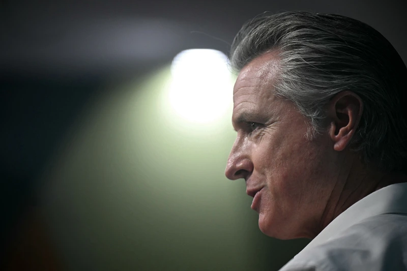 The Governor of California Gavin Newsom delivers a speech at Germany's pavilion during the COP30 UN Climate Change Conference, in Belem, Para State, Brazil, on November 11, 2025. President Donald Trump's administration may have steered clear of this year's UN climate summit in the Brazilian Amazon, but the conference's second day is nonetheless set to be dominated by the governors of California and New Mexico. (Photo by Mauro PIMENTEL / AFP) (Photo by MAURO PIMENTEL/AFP via Getty Images)
