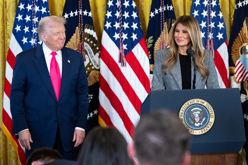 First Lady Melania Trump speaks alongside US President Donald Trump before signing an executive order on foster children and families in the East Room of the White House in Washington, DC, November 13, 2025. The executive order will be focused on supporting foster youth transitioning out of the system to adulthood by expanding and enhancing access to education, workforce and career development, digital resources, and other supports. (Photo by SAUL LOEB / AFP) (Photo by SAUL LOEB/AFP via Getty Images)