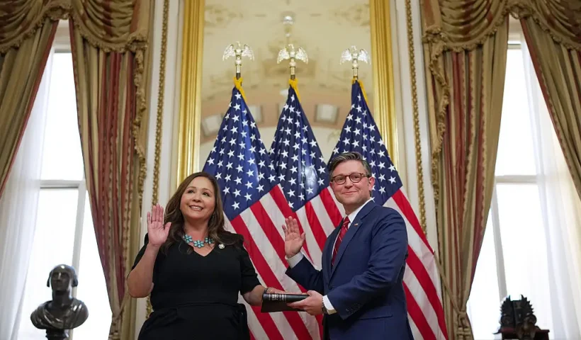 WASHINGTON, DC - NOVEMBER 12: (L-R) U.S. Rep. Adelita Grijalva (D-AZ) poses for a photo with Speaker of the House Mike Johnson (R-LA) during a ceremonial swearing-in at the U.S. Capitol Building on November 12, 2025 in Washington, DC. Grijalva, who won a special election to replace her late father Rep. Raul Grijalva on September 23, was not seated as a member of Congress until today after Speaker Johnson delayed her swearing-in amid the government shutdown. (Photo by Andrew Harnik/Getty Images)