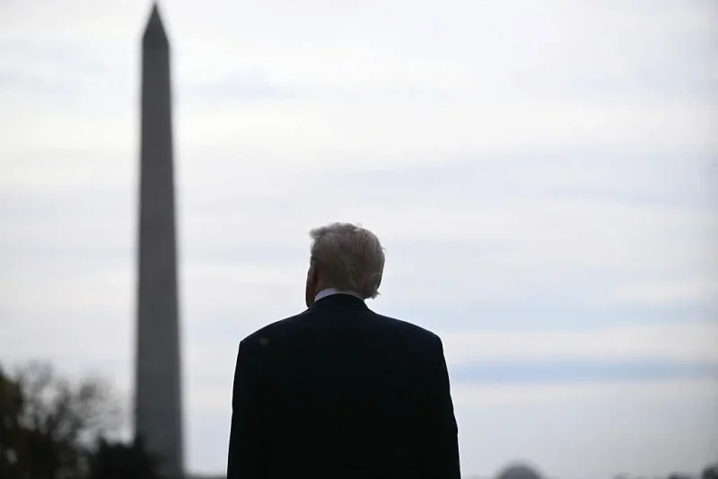 US President Donald Trump waits for the arrival of Crown Prince and Prime Minister of the Kingdom of Saudi Arabia Mohammed bin Salman on the South Lawn at the White House in Washington, DC on November 18, 2025. Saudi Crown Prince Mohammed bin Salman arrived at the White House to fanfare and a jet flyover Tuesday, in his first visit to the United States since the 2018 murder of journalist Jamal Khashoggi. (Photo by Brendan SMIALOWSKI / AFP) (Photo by BRENDAN SMIALOWSKI/AFP via Getty Images)