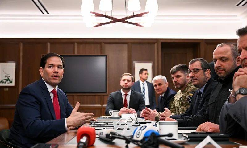 US Secretary of State Marco Rubio (L) speaks during a meeting with Ukrainian officials headed by Secretary of the National Security and Defense Council of Ukraine Rustem Umerov (R) in Hallandale Beach, Florida on November 30, 2025. (Photo by CHANDAN KHANNA / AFP via Getty Images)