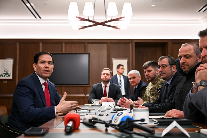 US Secretary of State Marco Rubio (L) speaks during a meeting with Ukrainian officials headed by Secretary of the National Security and Defense Council of Ukraine Rustem Umerov (R) in Hallandale Beach, Florida on November 30, 2025. (Photo by CHANDAN KHANNA / AFP via Getty Images)