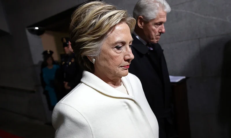 WASHINGTON, DC - JANUARY 20: Former Democratic presidential nominee Hillary Clinton (L) and former President Bill Clinton arrive on the West Front of the U.S. Capitol on January 20, 2017 in Washington, DC. In today's inauguration ceremony Donald J. Trump becomes the 45th president of the United States. (Photo by Win McNamee/Getty Images)