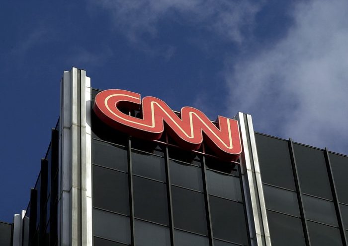 384757 02: The Cable News Network (CNN) logo adorns the top of CNN's offices on the Sunset Strip, January 24, 2000 in Hollywood, CA. CNN was hit with job cuts earlier this week after CNN's parent company, Time-Warner, Inc., completed its merger with America Online, Inc. (Photo by David McNew/Newsmakers)