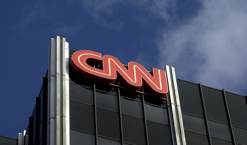 384757 02: The Cable News Network (CNN) logo adorns the top of CNN's offices on the Sunset Strip, January 24, 2000 in Hollywood, CA. CNN was hit with job cuts earlier this week after CNN's parent company, Time-Warner, Inc., completed its merger with America Online, Inc. (Photo by David McNew/Newsmakers)