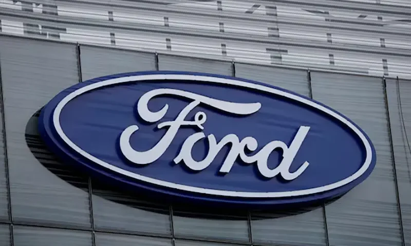 The blue Ford oval logo is displayed on the new Ford World Headquarters in Dearborn, Michigan, U.S. November 16, 2025. REUTERS/Rebecca Cook