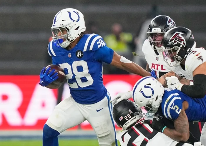 Indianapolis Colts running back Jonathan Taylor (28) runs with the ball during an NFL football game against the Atlanta Falcons, Sunday, Nov. 9, 2025, in Berlin, Germany. (AP Photo/Martin Meissner)