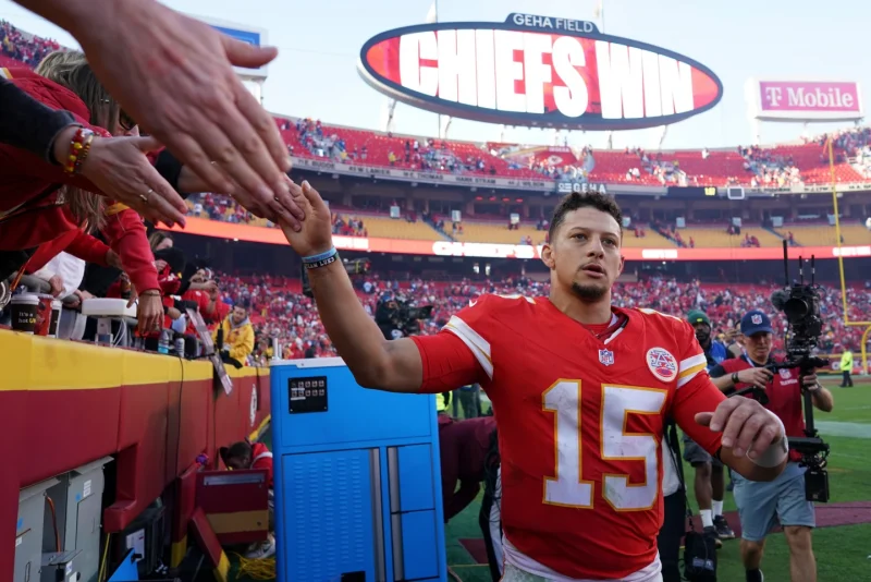 Kansas City Chiefs quarterback Patrick Mahomes (15) greets fans following an NFL football game against the Indianapolis Colts Sunday, Nov. 23, 2025, in Kansas City, Mo. (AP Photo/Ed Zurga)