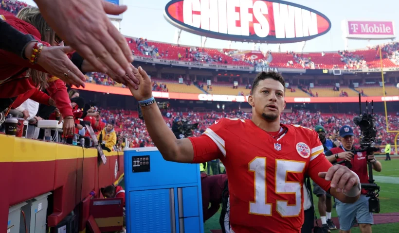 Kansas City Chiefs quarterback Patrick Mahomes (15) greets fans following an NFL football game against the Indianapolis Colts Sunday, Nov. 23, 2025, in Kansas City, Mo. (AP Photo/Ed Zurga)