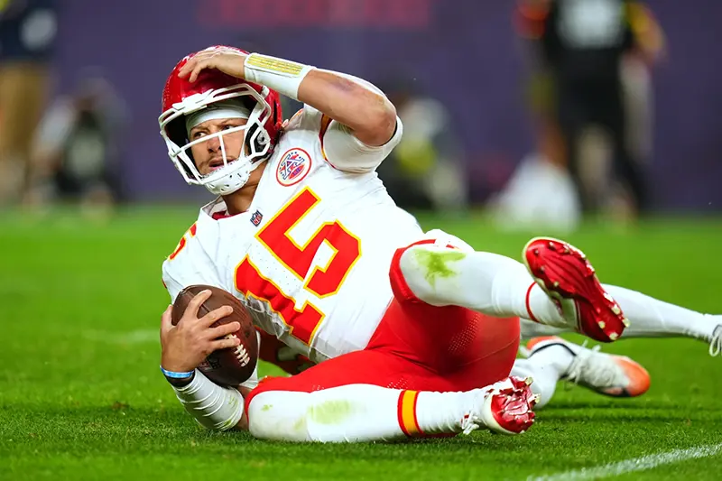 Kansas City Chiefs quarterback Patrick Mahomes (15) reacts after being sacked during the second half an NFL football game against the Denver Broncos Sunday, Nov. 16, 2025, in Denver. (AP Photo/Jack Dempsey)