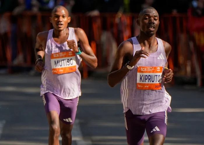 Benson Kipruto and Alexander Mutiso, both of Kenya, make their way through Central Park during the New York City Marathon, Sunday, Nov. 2, 2025, in New York. (AP Photo/Yuki Iwamura)