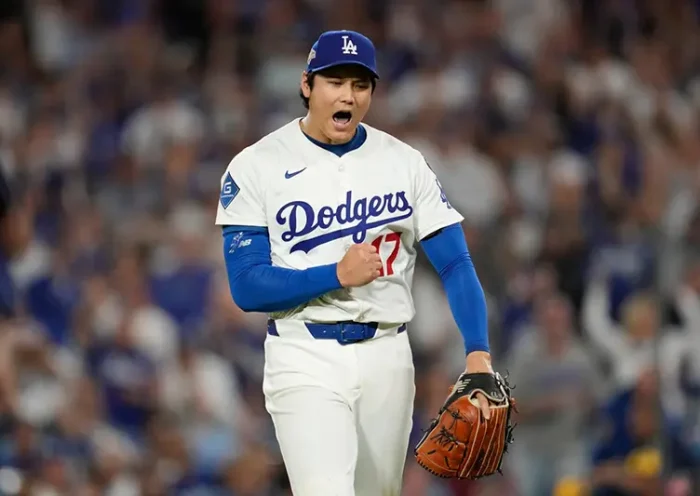 Los Angeles Dodgers pitcher Shohei Ohtani (17) reacts during Game 4 of baseball’s National League Championship Series against the Milwaukee Brewers, Friday, Oct. 17, 2025, in Los Angeles. (AP Photo/Ashley Landis, File)
