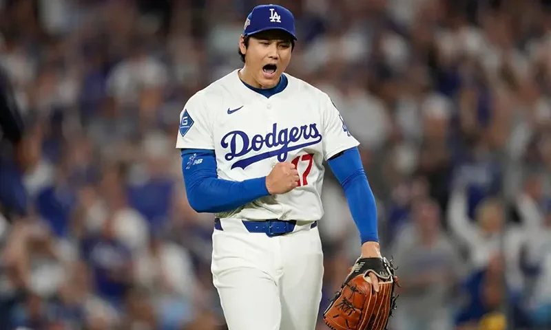 Los Angeles Dodgers pitcher Shohei Ohtani (17) reacts during Game 4 of baseball’s National League Championship Series against the Milwaukee Brewers, Friday, Oct. 17, 2025, in Los Angeles. (AP Photo/Ashley Landis, File)