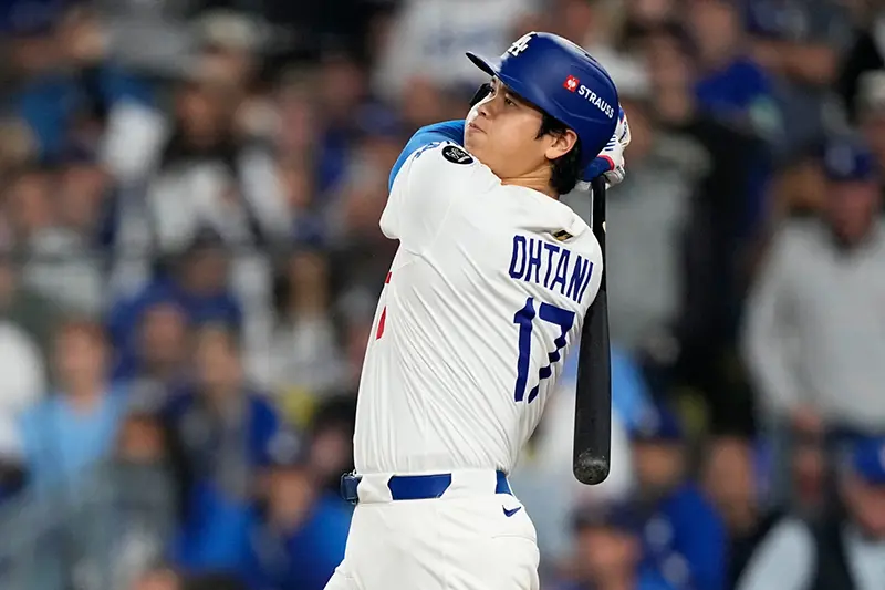 Los Angeles Dodgers’ Shohei Ohtani watches his home run against the Toronto Blue Jays during the seventh inning in Game 3 of baseball’s World Series, Monday, Oct. 27, 2025, in Los Angeles. (AP Photo/Brynn Anderson, File)