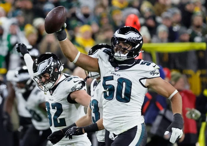 Philadelphia Eagles linebacker Jaelan Phillips (50) celebrates a fumble recovery against the Green Bay Packers during the first half of an NFL football game Monday, Nov. 10, 2025, in Green Bay, Wis. (AP Photo/Mike Roemer)