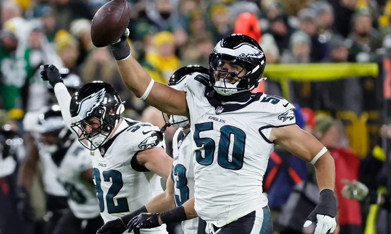 Philadelphia Eagles linebacker Jaelan Phillips (50) celebrates a fumble recovery against the Green Bay Packers during the first half of an NFL football game Monday, Nov. 10, 2025, in Green Bay, Wis. (AP Photo/Mike Roemer)