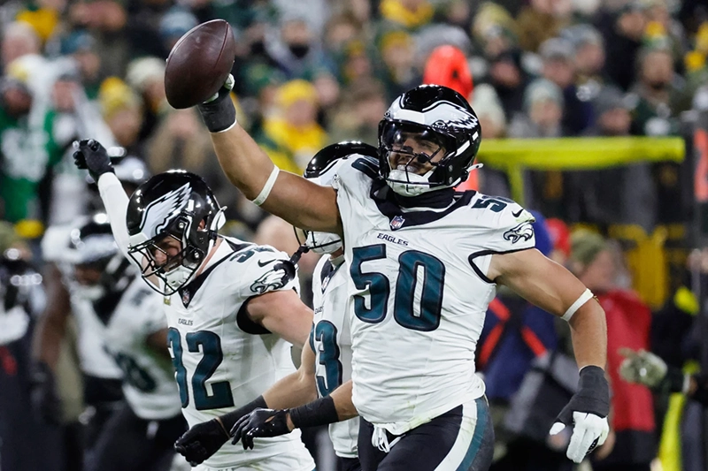 Philadelphia Eagles linebacker Jaelan Phillips (50) celebrates a fumble recovery against the Green Bay Packers during the first half of an NFL football game Monday, Nov. 10, 2025, in Green Bay, Wis. (AP Photo/Mike Roemer)