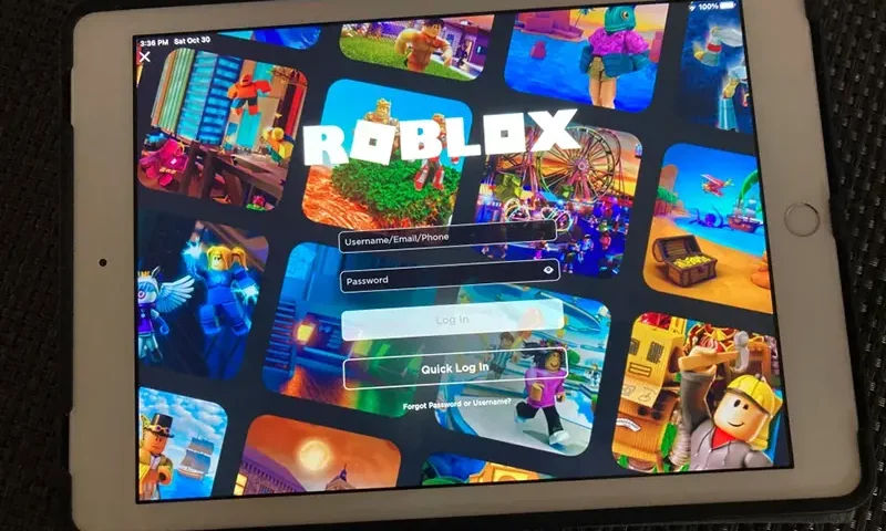 The gaming platform Roblox is displayed on a tablet, Oct. 30, 2021, in New York. (AP Photo/Leon Keith, File)
