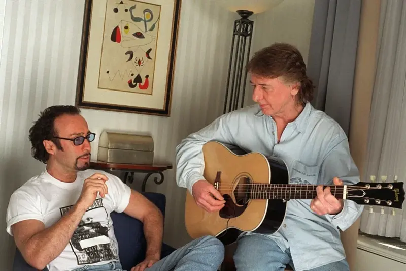 Paul Rodgers and Mick Ralphs in 1999. (AP Photo/Jim Cooper, File)