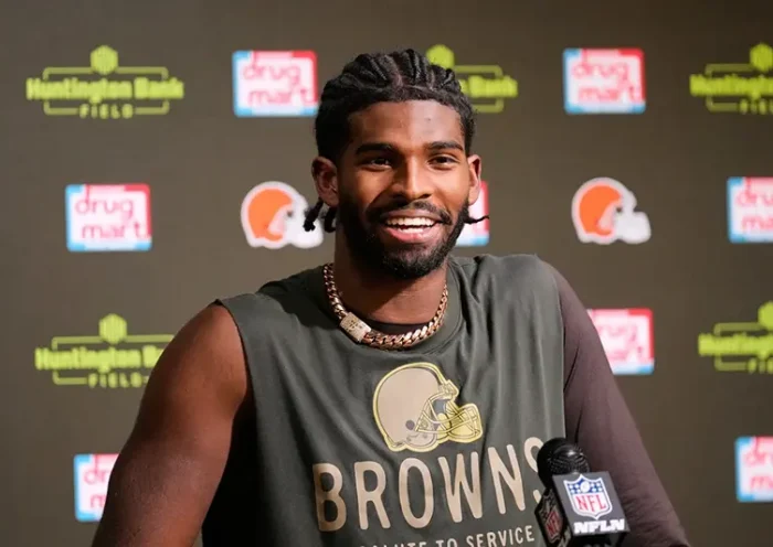 Cleveland Browns quarterback Shedeur Sanders responds to a question during a news conference after an NFL football game against the Baltimore Ravens in Cleveland, Sunday, Nov. 16, 2025. (AP Photo/Sue Ogrocki)