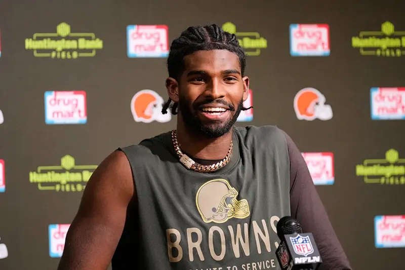 Cleveland Browns quarterback Shedeur Sanders responds to a question during a news conference after an NFL football game against the Baltimore Ravens in Cleveland, Sunday, Nov. 16, 2025. (AP Photo/Sue Ogrocki)