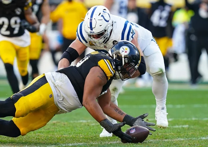 Pittsburgh Steelers defensive tackle Derrick Harmon (99) recovers a fumble in front of Indianapolis Colts guard Quenton Nelson (56) during the second half of an NFL football game in Pittsburgh, Sunday, Nov. 2, 2025. (AP Photo/Matt Freed)