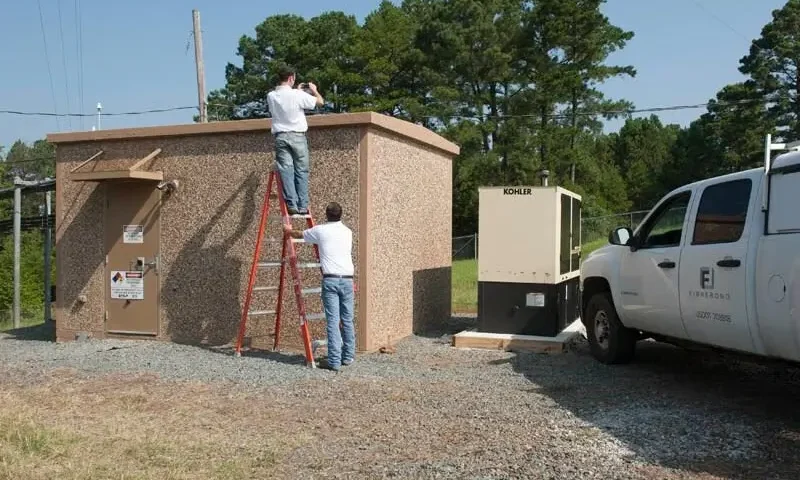 A post to X shows Two men finalizing a build offered by Fibrebond (Photo: @Fibrebond on X)