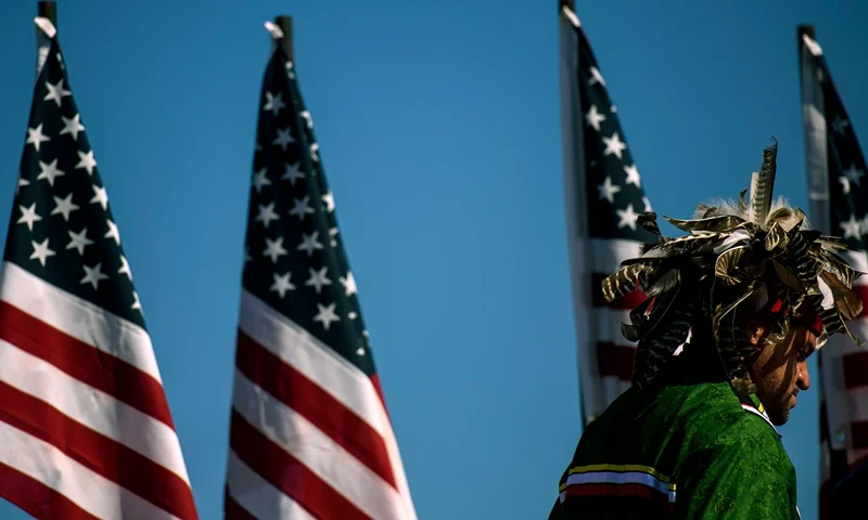 LUMBERTON, NC - OCTOBER 24: People attend a campaign rally for President Donald Trump on October 24, 2020 in Lumberton, North Carolina. President Trump has expressed his support for the Lumbee Indian people to be recognized on a federal level. President Trump continues to campaign against Democratic presidential nominee Joe Biden leading up to the November 3rd Election Day. (Photo by Melissa Sue Gerrits/Getty Images)