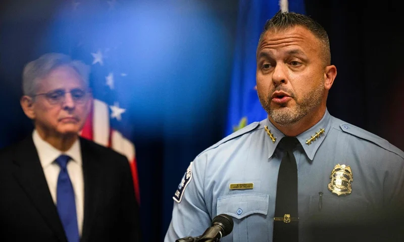 US Attorney General Merrick B. Garland (L) looks on as Minneapolis Police Chief Brian O'Hara (R) addresses the findings of a Justice Department investigation into the Minneapolis Police Department during a press conference in Minneapolis, Minnesota on June 16, 2023. The Department of Justice released a damning report today on the Minneapolis police following the murder of George Floyd by former police officer Derek Chauvin in 2020. (Photo by STEPHEN MATUREN / AFP) (Photo by STEPHEN MATUREN/AFP via Getty Images)