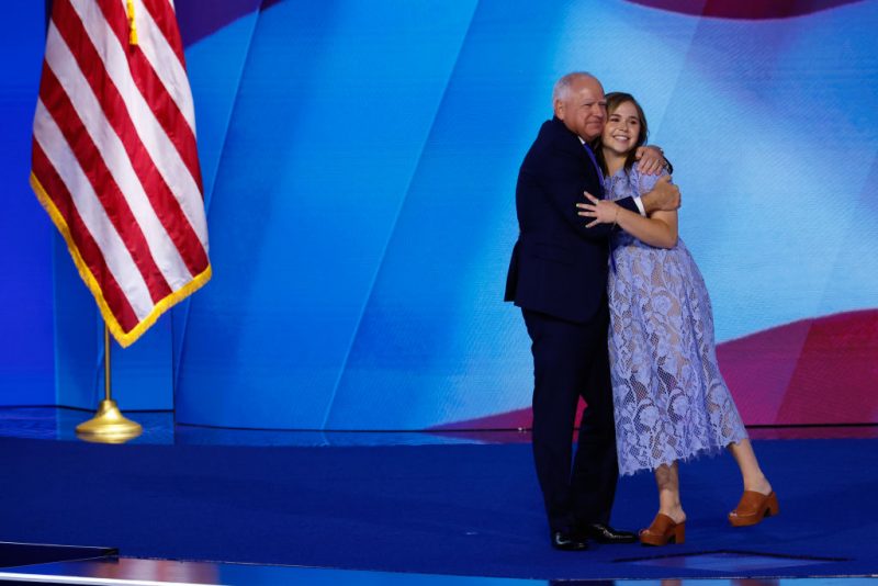 CHICAGO, ILLINOIS - AUGUST 21: Democratic vice presidential nominee Minnesota Gov. Tim Walz celebrates with his daughter Hope Walz after accepting the Democratic vice presidential nomination on stage during the third day of the Democratic National Convention at the United Center on August 21, 2024 in Chicago, Illinois. Delegates, politicians, and Democratic Party supporters are in Chicago for the convention, concluding with current Vice President Kamala Harris accepting her party's presidential nomination. The DNC takes place from August 19-22. (Photo by Chip Somodevilla/Getty Images)