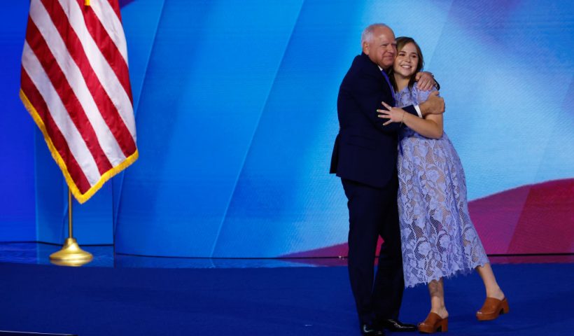 CHICAGO, ILLINOIS - AUGUST 21: Democratic vice presidential nominee Minnesota Gov. Tim Walz celebrates with his daughter Hope Walz after accepting the Democratic vice presidential nomination on stage during the third day of the Democratic National Convention at the United Center on August 21, 2024 in Chicago, Illinois. Delegates, politicians, and Democratic Party supporters are in Chicago for the convention, concluding with current Vice President Kamala Harris accepting her party's presidential nomination. The DNC takes place from August 19-22. (Photo by Chip Somodevilla/Getty Images)
