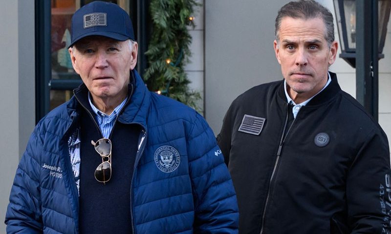 A November 29, 2024 photo shows US President Joe Biden and son Hunter Biden stepping out of a bookstore while shopping in Nantucket, Massachusetts on November 29, 2024. Biden on Sunday issued an official pardon for his son Hunter, who is facing sentencing for two criminal cases related to tax evasion and the purchase of a firearm. (Photo by Mandel NGAN / AFP) (Photo by MANDEL NGAN/AFP via Getty Images)
