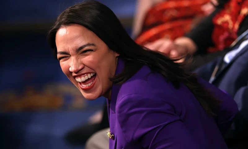 WASHINGTON, DC - JANUARY 03: U.S. Rep. Alexandria Ocasio-Cortez (D-NY) arrives for the first day of the 119th Congress in the House Chamber of the U.S. Capitol Building on January 03, 2025 in Washington, DC. Rep. Mike Johnson (R-LA) is working to retain the Speakership in the face of opposition within his own party as the 119th Congress holds its first session to vote for a new Speaker of the House. (Photo by Win McNamee/Getty Images)