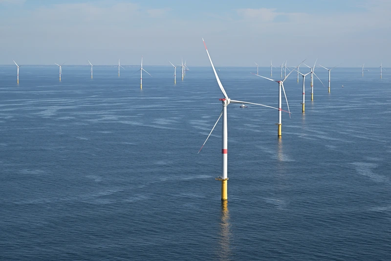 This aerial photograph shows an offshore wind farm off the coasts of Saint-Nazaire, western France on October 1, 2025. (Photo by Damien MEYER / AFP) (Photo by DAMIEN MEYER/AFP via Getty Images)