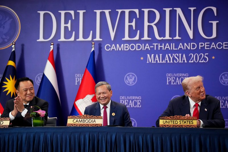 KUALA LUMPUR, MALAYSIA - OCTOBER 26: Thai Prime Minister Anutin Charnvirakul, Cambodian Prime Minister Hun Manet and U.S. President Donald Trump react during the signing of a Cambodia-Thailand peace deal at Kuala Lumpur Convention Centre on October 26, 2025 in Kuala Lumpur, Malaysia. Trump is in Malaysia for the Association of Southeast Asian Nations (ASEAN) summit, and will next travel to Japan, en route to South Korea for the Asia-Pacific Economic Cooperation (APEC) forum. (Photo by Andrew Harnik/Getty Images)