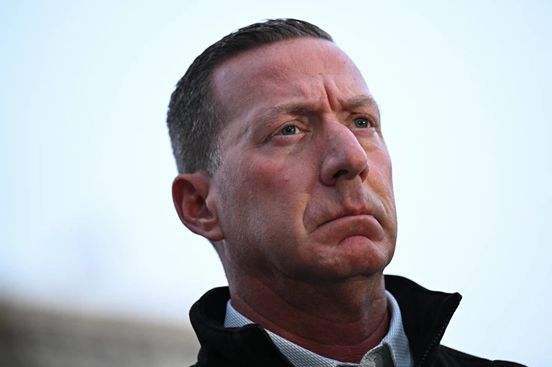 US Secret Service Director Sean Curran looks on during a press conference after a shooting in downtown Washington, DC, on November 26, 2025. On November 26, FBI Director Kash Patel told reporters two National Guard troops shot blocks away from the White House in downtown Washington were critically wounded, clarifying earlier erroneous reports that they had died. (Photo by Drew ANGERER / AFP via Getty Images)
